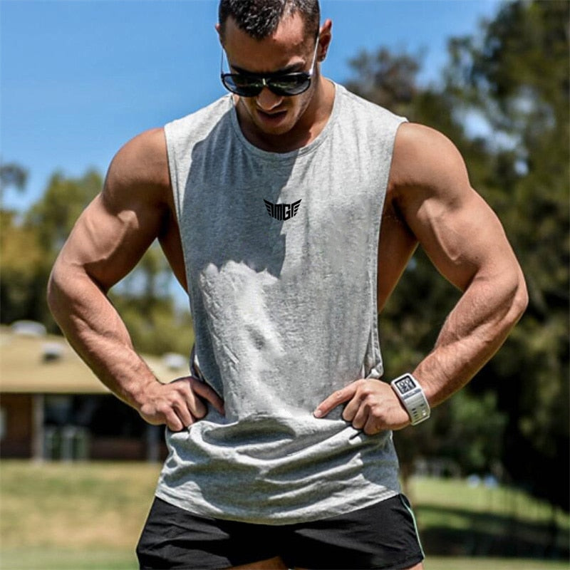 Bodybuilding Tank Tops Men Sports Sleeveless shirt Muscle guys Vest Fitness Drop Armhole Solid Tops Tees Cotton Gym Singlets