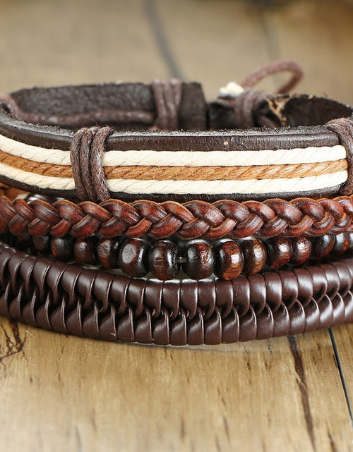 Load image into Gallery viewer, 4Pcs/ Set Braided Wrap Leather Bracelets for Men Vintage Life Tree Rudder Charm Wood Beads Ethnic Tribal Wristbands
