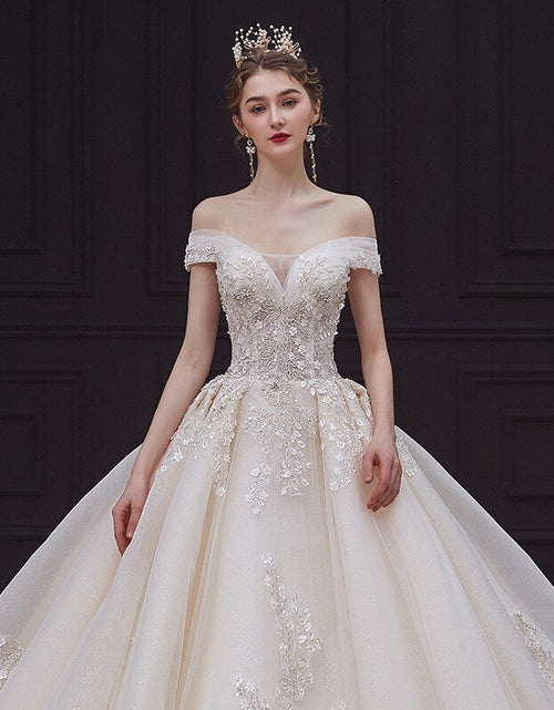 Load image into Gallery viewer, Luxury Handmade Boat Neck Wedding Dress With Train Lace Flower Bridal Dress Elegant Off The Shoulder Ball Gown Robe De Mariee
