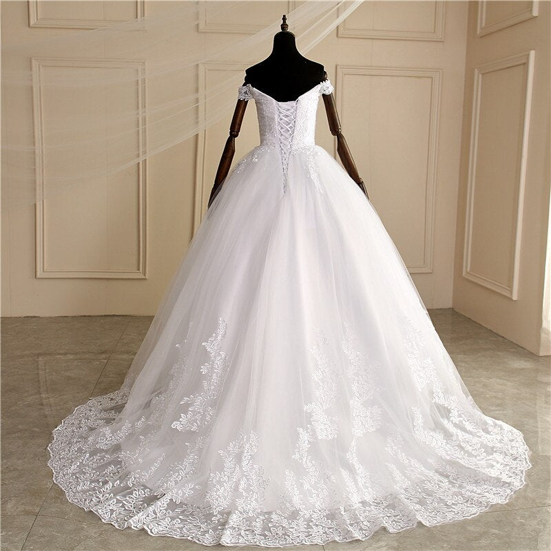 2022 Luxury Lace Boat Neck Ball Gown Wedding Dresses Sweetheart Sheer Back Princess Illusion Applique Bridal Gowns Casamento