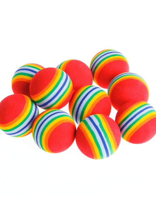 Load image into Gallery viewer, Rainbow EVA Cat Toys Ball Interactive Cat Dog Play Chewing Rattle Scratch EVA Ball Training Balls Pet Toys Supplies
